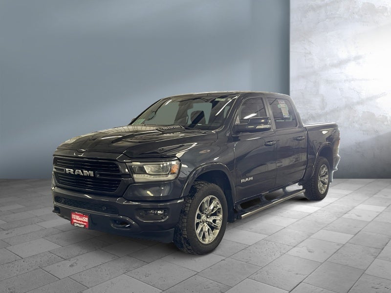 2020 RAM 1500 Laramie in Gray — front three-quarter view
