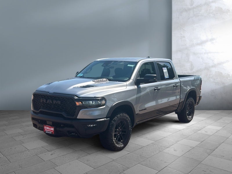 2025 RAM 1500 Rebel in Silver — front three-quarter view