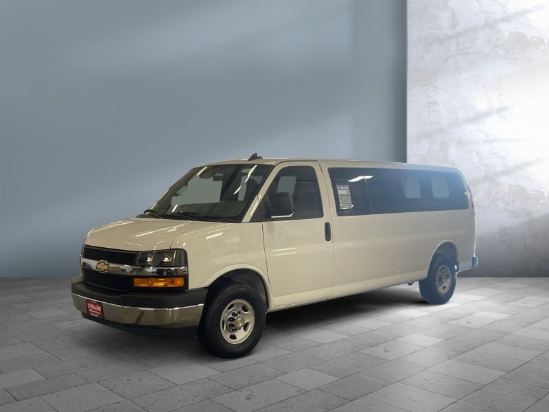 2025 Chevrolet Express Passenger 1LT in Summit White — front three-quarter view