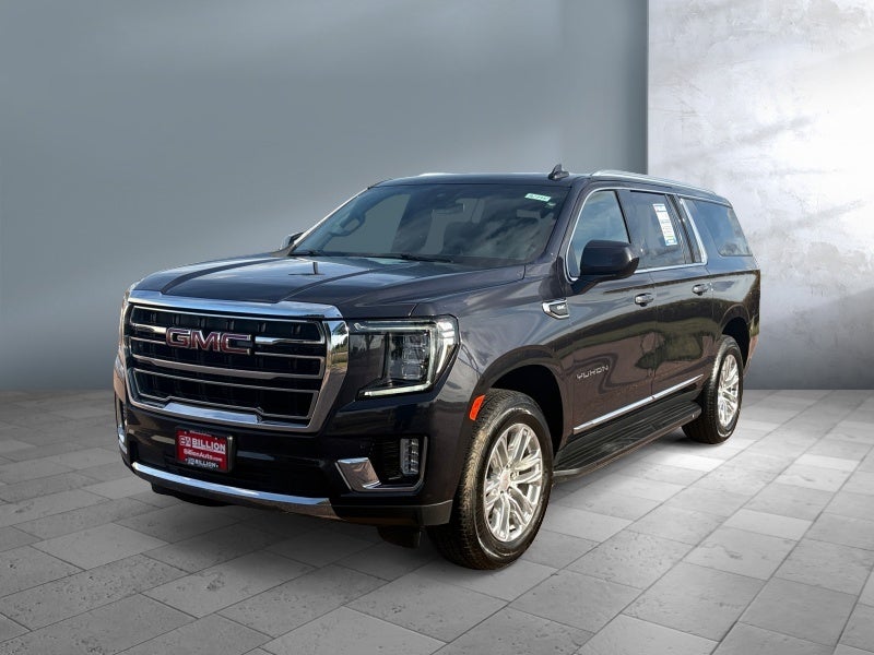 2024 GMC Yukon XL SLT in Titanium Rush Metallic — front three-quarter view