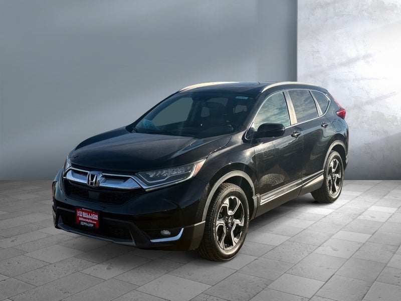 2017 Honda CR-V Touring in Black — front three-quarter view